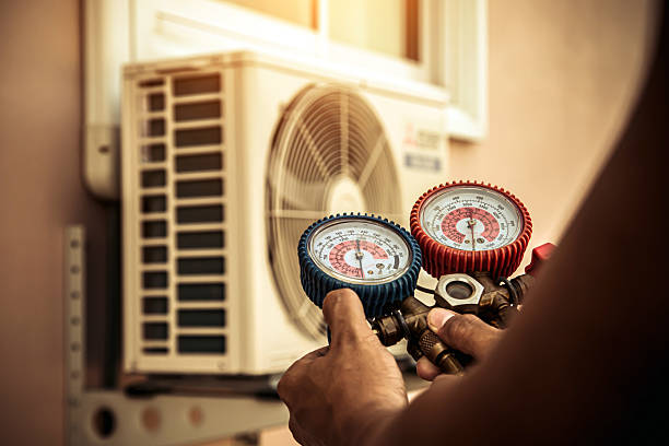Professional Heat Pump Repair technician working in Alvarado, TX